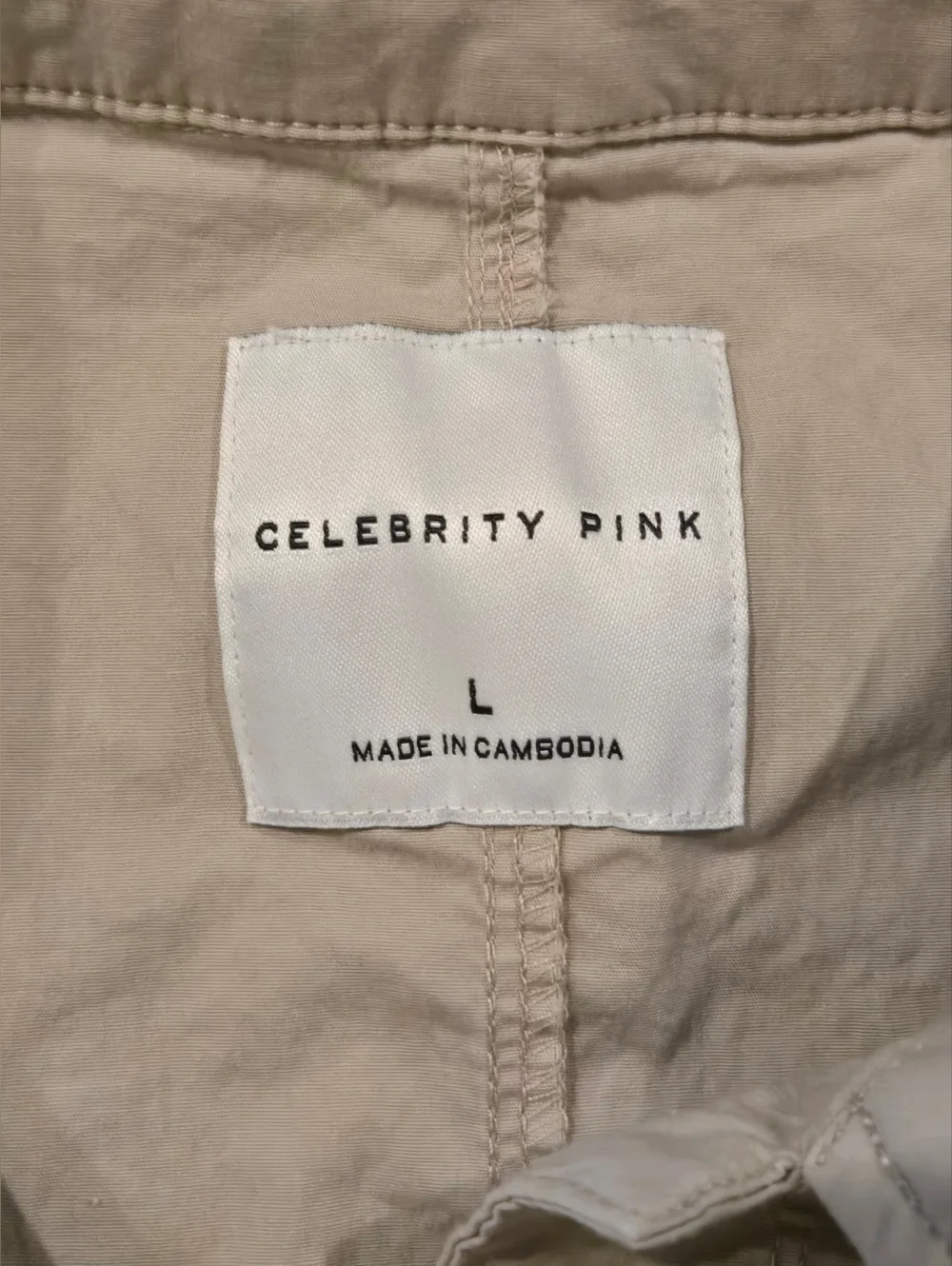 Celeberity Pink Sleeveless Drawstring Romper in Light Beige